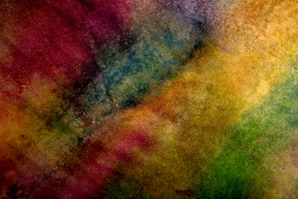 Çok renkli kağıttaki lekelerin koyu arkaplanı
