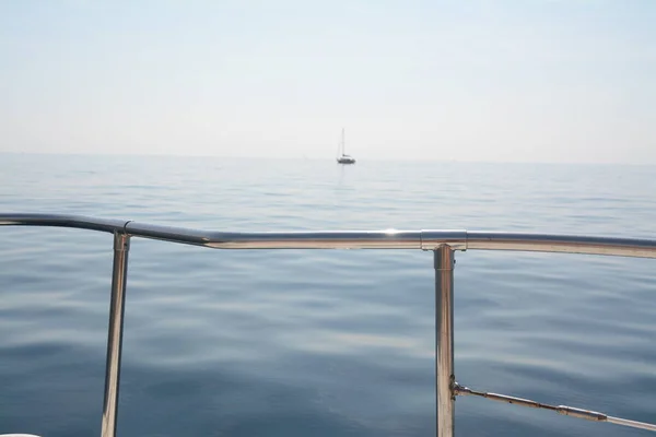 life on ships runs slowly observing the sea in the sun of the Mediterranean sea