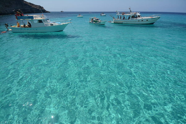 Transparent and blue water in the sea of Lampedusa at the Rabbits beach. The Pelagie Islands are the southernmost point of Italy in Sicily.