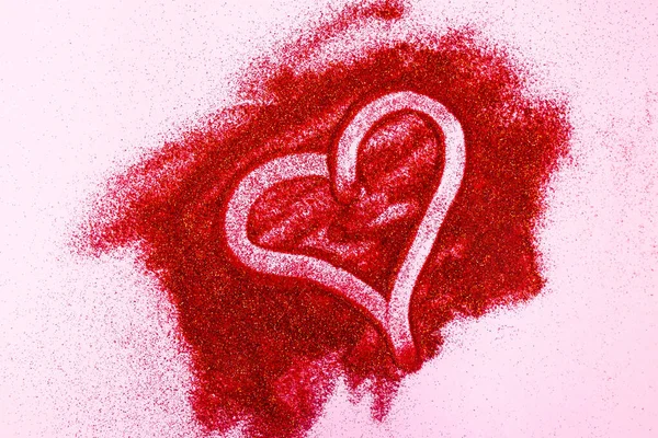 Hearts painted by finger on red glitter. Valentines Day concept — Stock Photo, Image