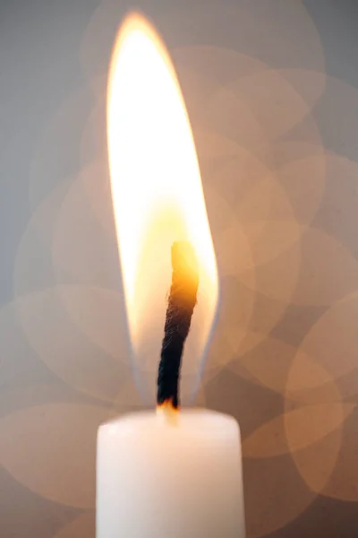 Close-up of burning Christmas candle. christmas lights — Stock Photo, Image