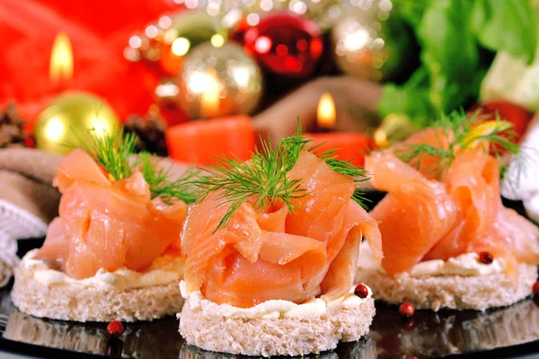 Holiday appetizer with salmon canapes — Stock Photo, Image