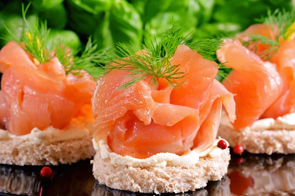 Holiday appetizer with salmon canapes — Stock Photo, Image