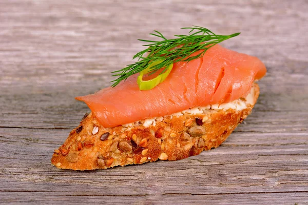 Sandwich with smoked salmon — Stock Photo, Image