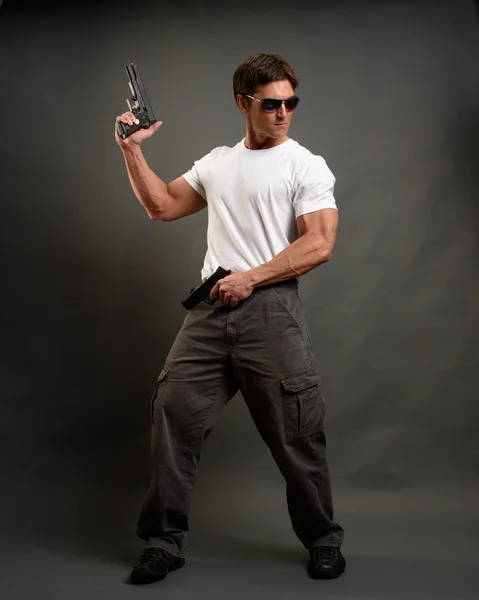 Strong man as secret agent — Stock Photo, Image