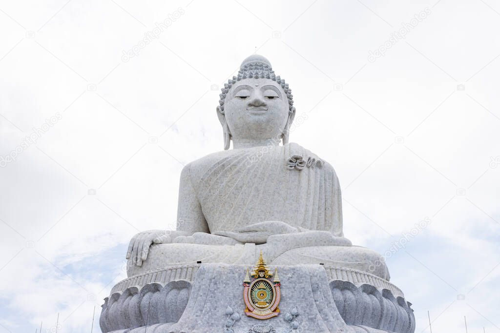 White big buddha with white sky of cloudy, have Thai King symbol