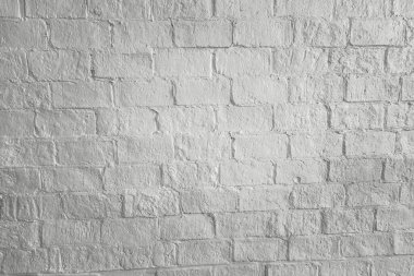 Geniş beyaz tuğla duvar arka plan kadar temiz görünüyor