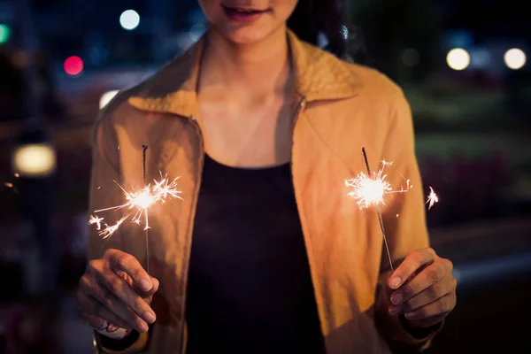 Lady Hold Two Firesparklers Blink Her Hand Night Toning Smile — Stock Photo, Image