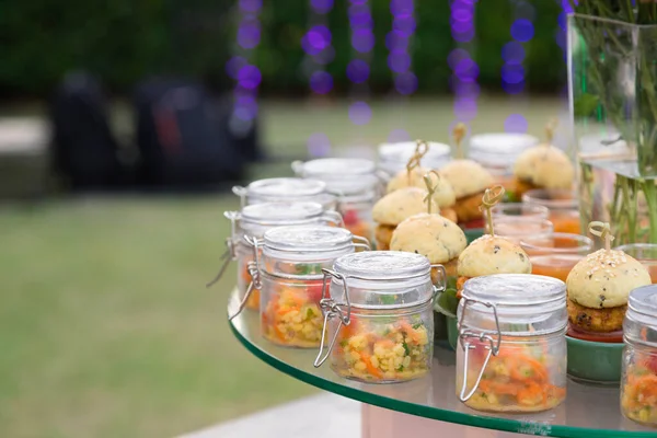 indian food buffet for party put on big glass plate to let guest take them