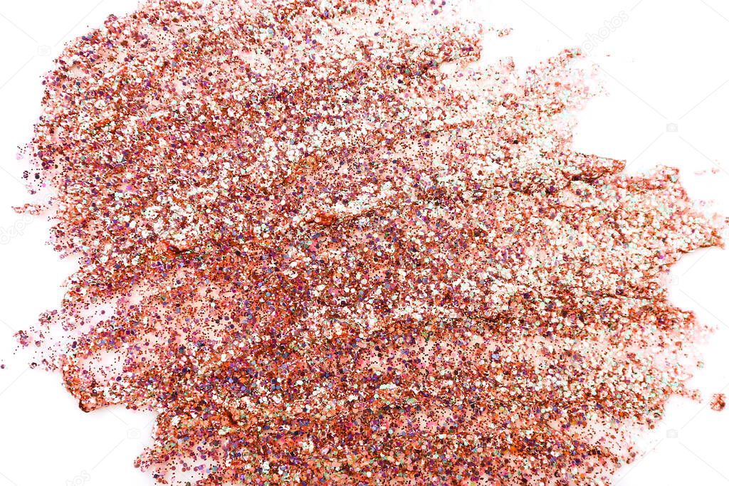 Texture close up of cosmetic gel for a body with glitter and spangles on white background