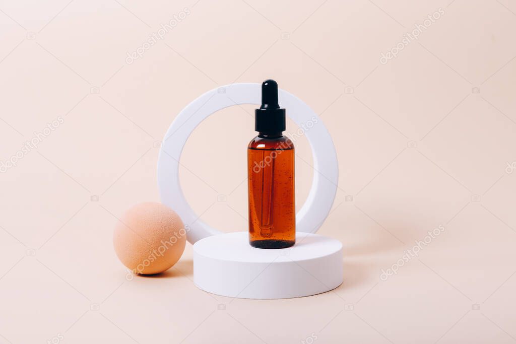 Trendy background with natural cosmetic skincare bottle on beige background. Product presentation.