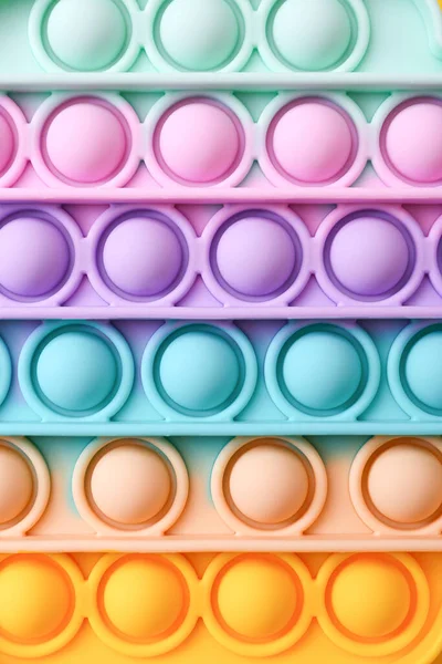 Colorful antistress sensory toy fidget push pop it , close up Royalty Free Stock Images