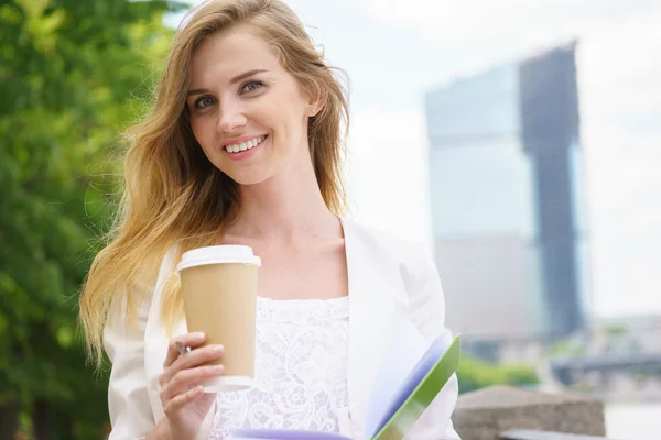 Young business Woman with coffee to Go