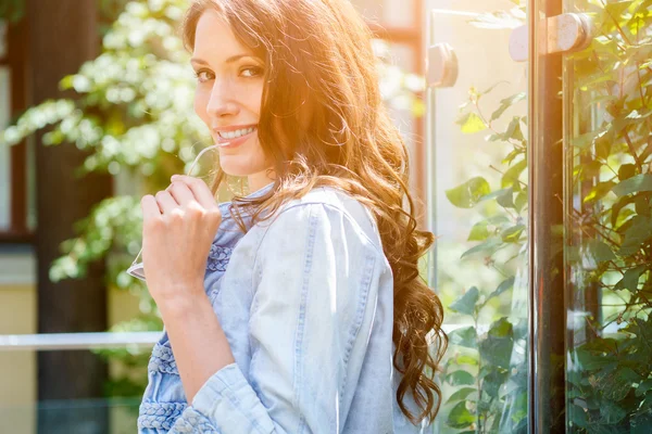 Portrait of lovely smiling woman in profile — Stock Photo, Image