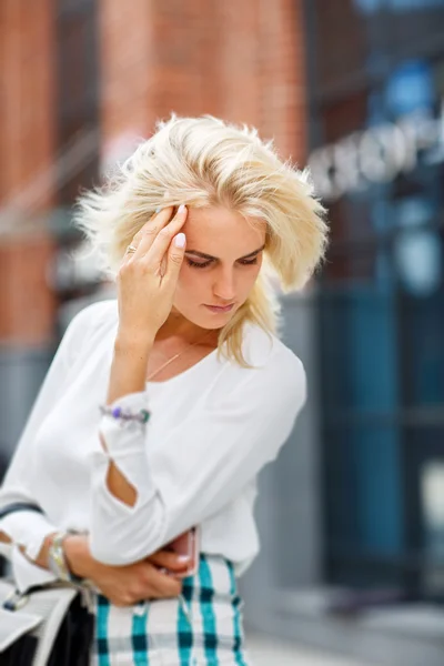 Beautiful girl with a headache — Stock Photo, Image