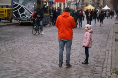 03-03-2021 Riga, LAtvia Baby girl in pink jacket