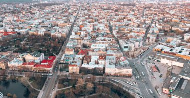 RIga rooftop view panorama at sunset with urban architectures and Daugava River.