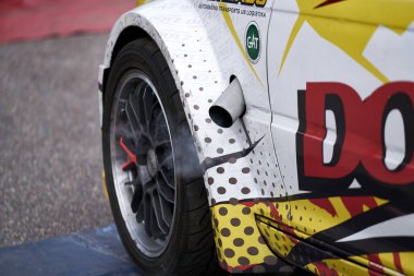 22-1-05-2021 Riga, Latvia. Power drifting car rear view. Yellow drifting car.