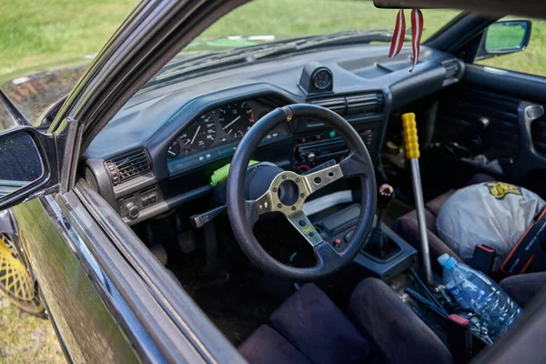 21-05-2021 Riga Latvia sports car interior with roll cage and drift handbrake night photography.