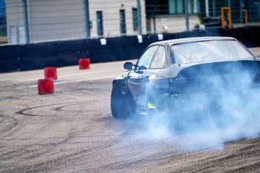 21-10-2021 Riga, LAtvia Car drifting, Sport car wheel drifting and smoking on track