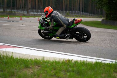 10-05-2021 Lithuania, Kaunas Moto rider, Motorcyclist rides at fast sport bike.