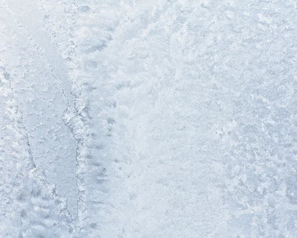 Красивый ледяной узор на стекле — стоковое фото