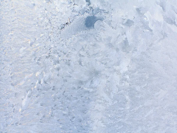 Ice patterns on winter glass — Stock Photo, Image