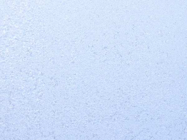 Frostiges natürliches Muster am Winterfenster. — Stockfoto