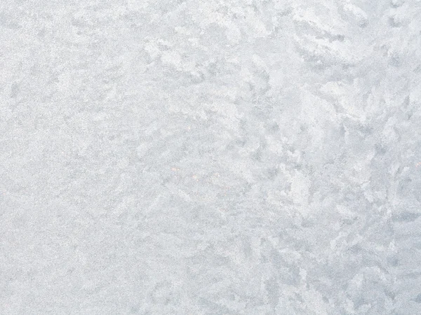 Frostiges natürliches Muster am Winterfenster. — Stockfoto