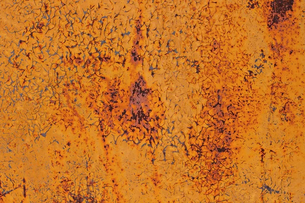 Old metal rusty with cracked paint. Stock Picture