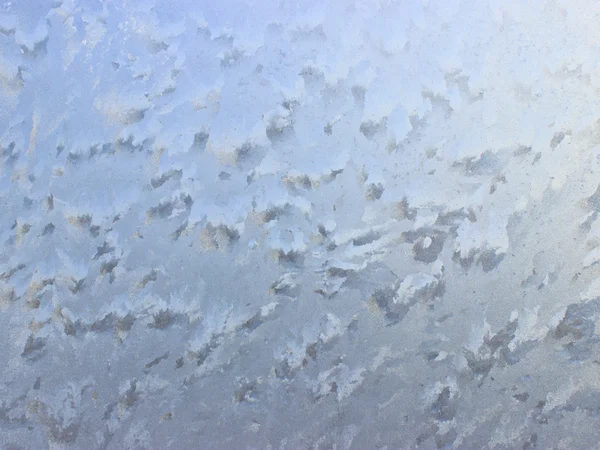 Schönes frostiges Muster auf Glas. — Stockfoto