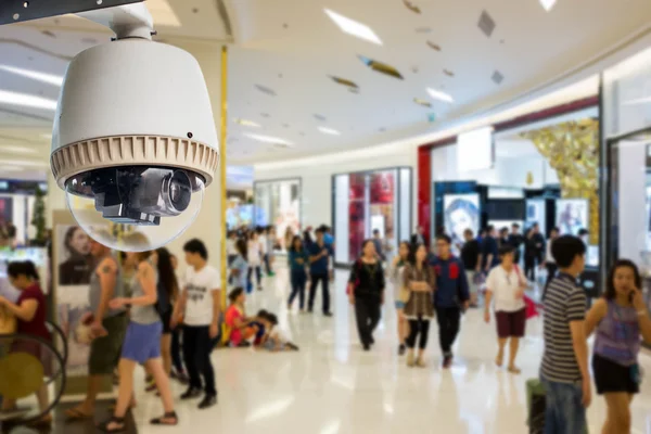 CCTV kamera vagy működő felügyeleti zsúfolt emberek bac — Stock Fotó