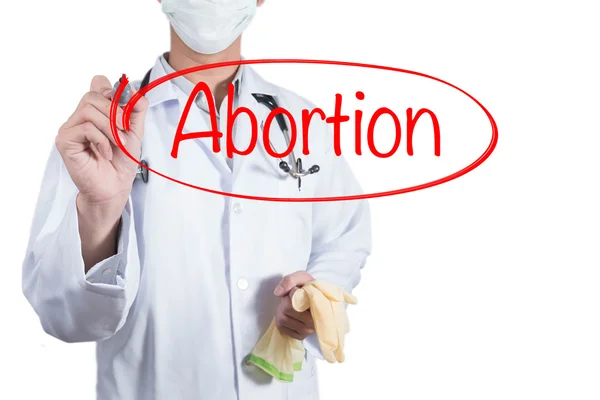 Médico usando pluma roja dibujar círculo sobre el aborto — Foto de Stock