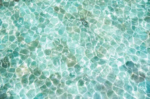 Textura de la superficie del agua en la piscina — Foto de Stock
