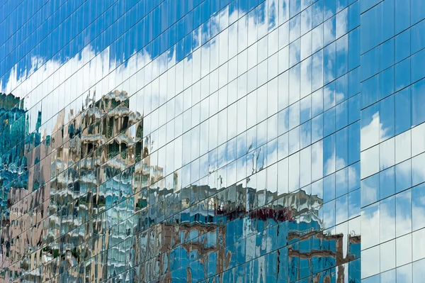 Building glass reflect city and sky scrabber — Stock Photo, Image