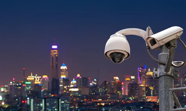 CCTV or surveillance with Blurring City in background — Stock Photo, Image