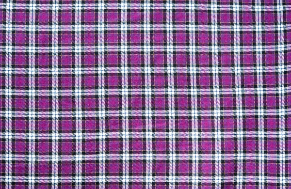 Текстура фіолетового шотландського візерунка на тканині — стокове фото