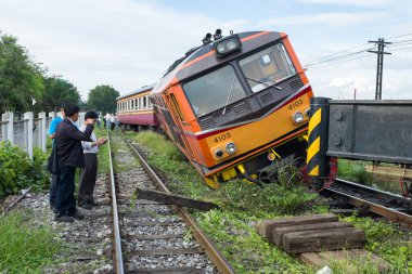BANGKOK THAILAND - JULY 31, 2014: train acciden fail of track ne clipart