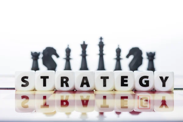 Strategi block ord om schack ombord affärsidé för strategi — Stockfoto