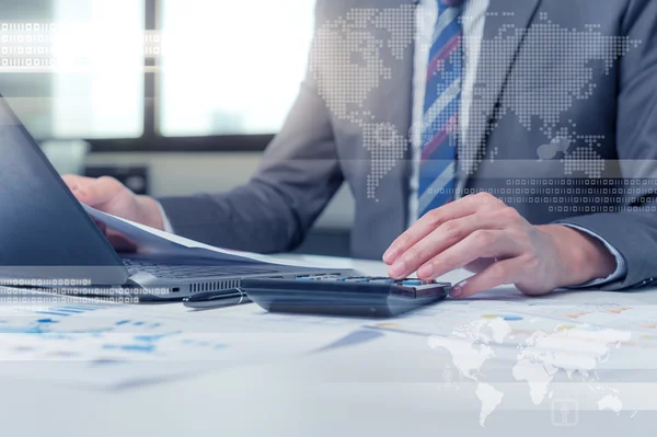 Close up of business man typing on laptop computer with technolo — Stock Photo, Image