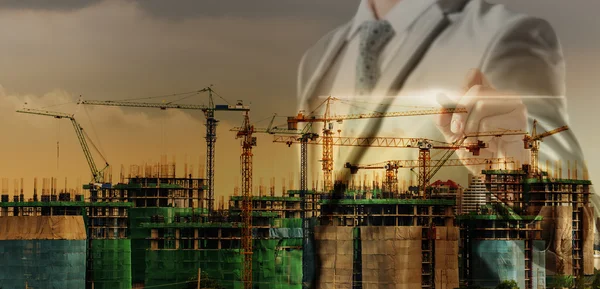 Double layer of businessman and construction site, business conc — Stock Photo, Image