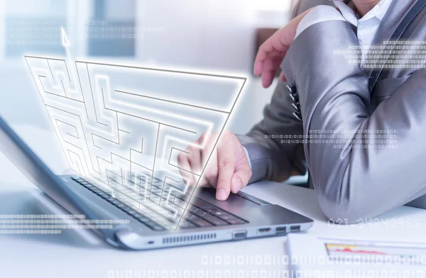 Businessman working on laptop maze solving, business strategy co — Stock Photo, Image