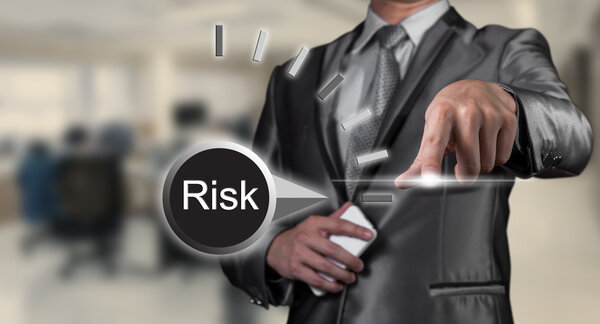 businessman working on risk management, business concept