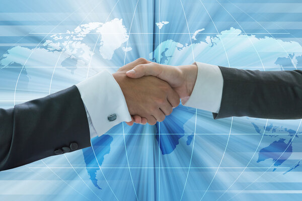Бизнес-рукопожатие, концепция глобализации бизнеса
