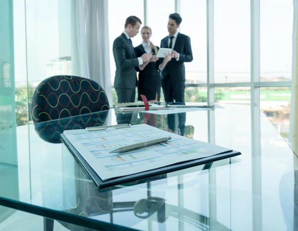 Business partners discussing documents and ideas at meeting — Stock Photo, Image