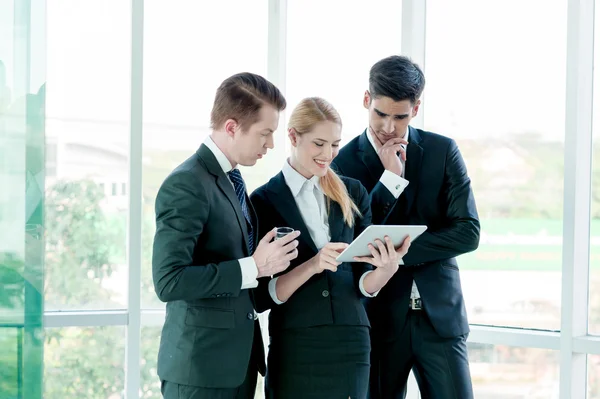 Business partners discussing documents and ideas at meeting — Stock Photo, Image