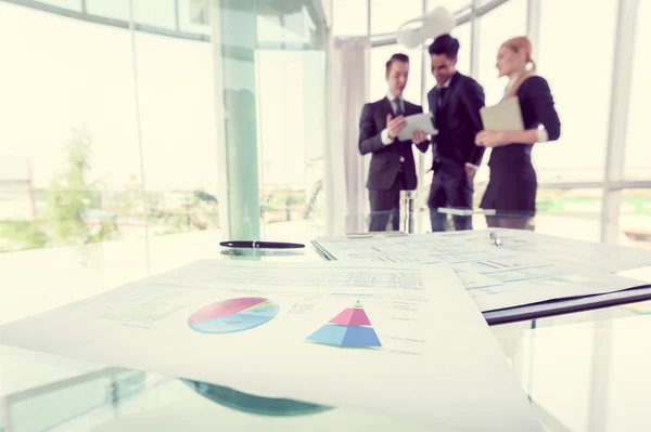 Business partners discussing documents and ideas at meeting — Stock Photo, Image