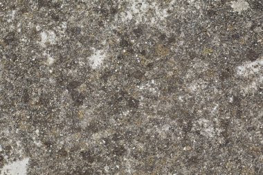 Arka planda beton dokusu olan eski gri beton duvar. Kopyalama alanı ile ön görünüm.