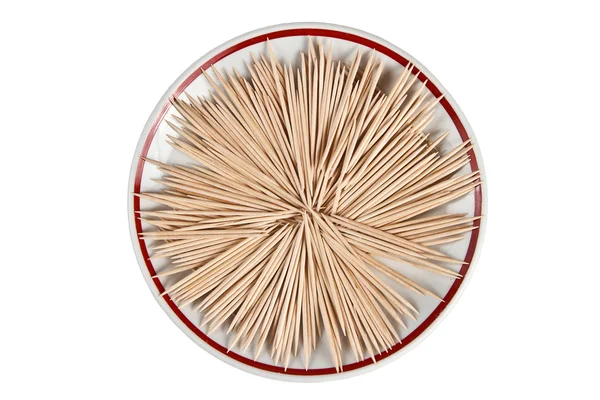 Drewniane wykałaczki ułożone na talerzu — Zdjęcie stockowe