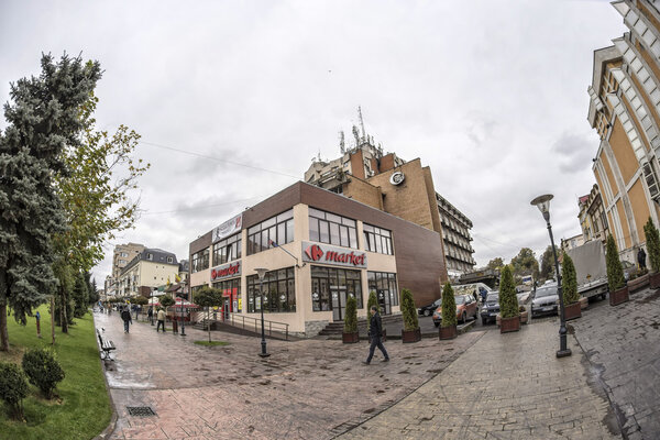 TARGU-JIU, ROMANIA-OCTOBER 08: Buildings in the downtown area  on October 08, 2014 in Targu-Jiu. Fisheye view.